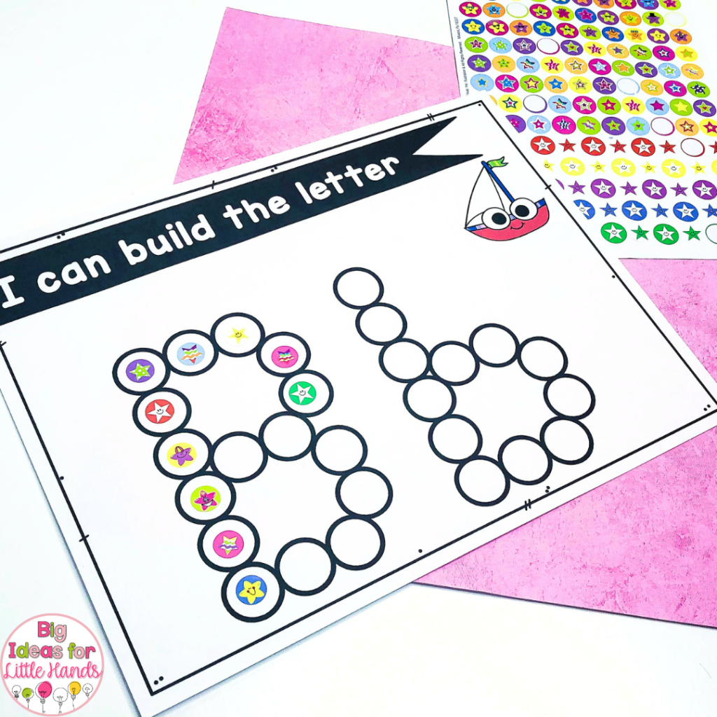 This photo highlights some fun alphabet activity mats that can be used alongside stickers to build fine motor skills.