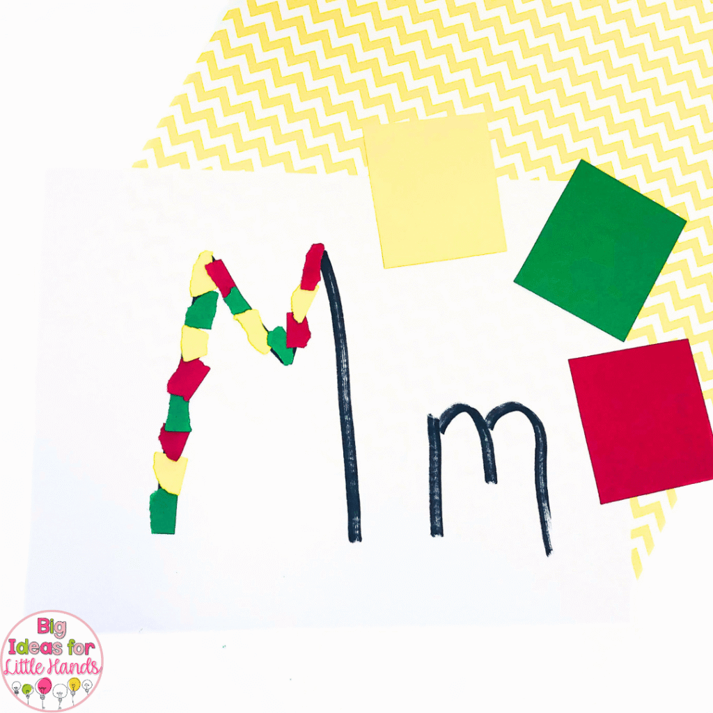 This photo shows a paper tearing activity that will help students build letter recognition as well as fine motor skills.