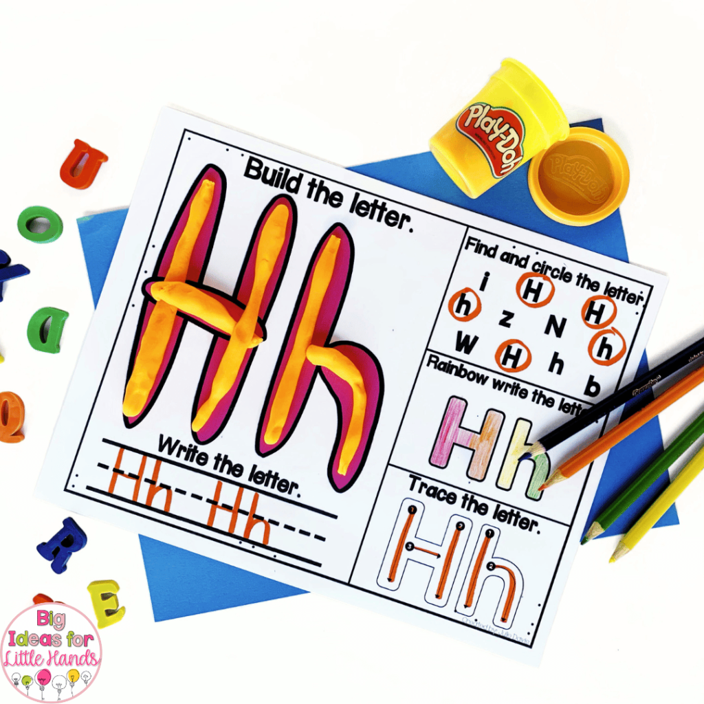 With the resources in this photo, students will build letters with playdough, as well as find and write the letter.